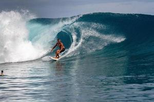 TAHITI, FRENCH POLYNESIA - AUGUST 5 2018 - Surfer training days before Billabong Tahiti Competition at Teahupoo reef photo