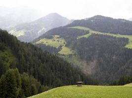 Dolomites panorama on cloudy day photo