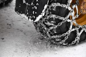 winter snow tire chain of car detail photo