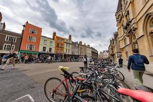 OXFORD, ENGLAND - JULY 15 2017 - Tourists in University town one of most visited in the world photo