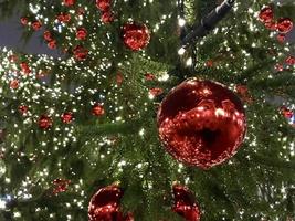 christmas tree red balls decorations at street market photo