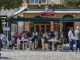 PORTOFINO, ITALY - MARCH 14 2021 - Pictoresque Italian Village crowded the last day before COVID lockdown photo