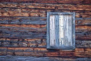 Old wood  mountain cabin hut window photo