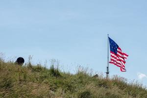 fort mchenry baltimore usa flag while waving photo
