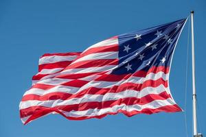 fort mchenry baltimore usa flag while waving photo