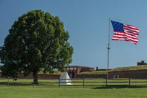 fort mchenry baltimore usa flag while waving photo