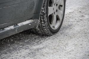 winter snow tire of car detail photo