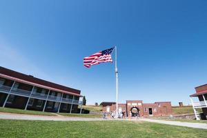 fort mchenry baltimore usa flag while waving photo