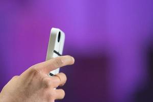 hand taking picture with smartphone photo