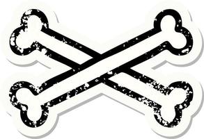 distressed sticker tattoo in traditional style of cross bones vector