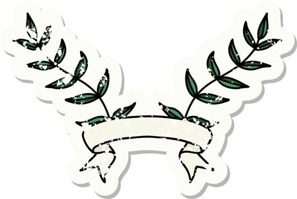 worn old sticker with banner of leaves