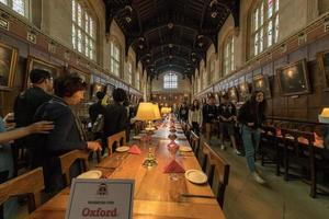 OXFORD, ENGLAND - JULY 15 2017 - Tourists in University town one of most visited in the world photo