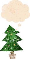 cartoon christmas tree and thought bubble in retro textured style vector