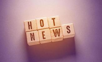 Hot News Word with Wooden Cubes photo