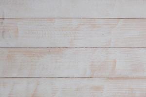 Vintage colored wood background texture with knots and nail holes. Old painted wood wall. Wooden dark horizontal boards. Front view with copy space. photo