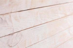 Vintage colored wood background texture with knots and nail holes. Old painted wood wall. Wooden dark horizontal boards. Front view with copy space. photo