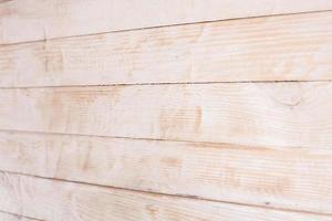 Vintage colored wood background texture with knots and nail holes. Old painted wood wall. Wooden dark horizontal boards. Front view with copy space. photo