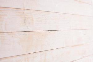 Vintage colored wood background texture with knots and nail holes. Old painted wood wall. Wooden dark horizontal boards. Front view with copy space. photo