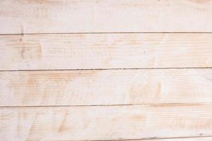 Vintage colored wood background texture with knots and nail holes. Old painted wood wall. Wooden dark horizontal boards. Front view with copy space. photo