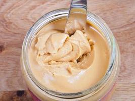 peanut butter in a glass jar photo