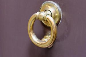 old brass ring door handle photo