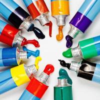 multicolored tubes with squeezed watercolors photo