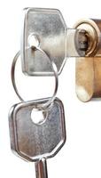 bunch of house keys in cylinder lock photo