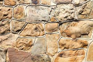 outdoor wall from natural stones photo