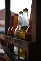 various seasonings of chicken noodles in a glass bottle photo