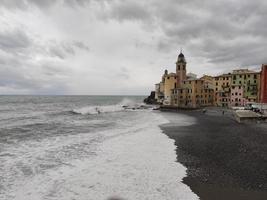 Camogli, Liguria, Italy picturesque fishermen village during sea storm swell photo