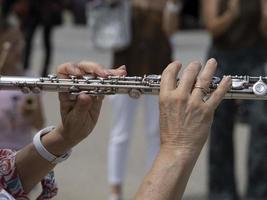 hands playing traverse flute photo