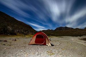 tent camp at night in baja california desert photo