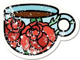 distressed sticker tattoo in traditional style of a cup and flowers vector