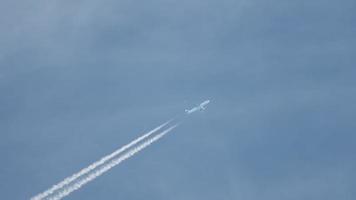 Jet plane flying high in the sky. Long shot, airliner in the sky video