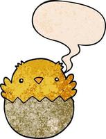 cartoon chick hatching from egg and speech bubble in retro texture style vector