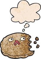 cartoon bitten cookie and thought bubble in grunge texture pattern style vector