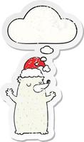 cute cartoon christmas bear and thought bubble as a distressed worn sticker vector