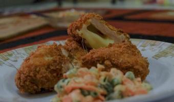 This is home cooking, Chicken Cordon bleu or schnitzel cordon bleu is a dish of chicken meat wrapped in cheese, then breaded and fried. photo
