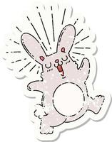 worn old sticker of a tattoo style prancing rabbit vector