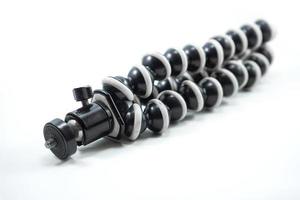 gorilla pod or tripod flexible isolated on white background photo