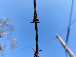 barbed wire on medieval alley of Sant Ilario village Genoa photo