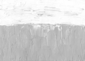 Abstract white textured background. Light monochrome overlay. Gray and white backdrop. Minimalist painting. Brush strokes on paper. photo