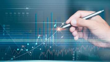 Businessman analyzing sales growth technique graph formulate marketing strategies and plans and manage the improvements that need to be fixed for business success both financial and investment photo