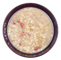 top view of bean soup in bowl isolated on white photo