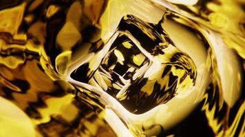 Golden metallic liquid flowing in weightlessness. Infinitely looped animation. video