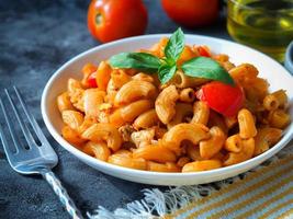 Macaroni pasta with tomato sauce photo