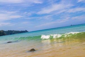 Naithon Beach bay turquoise clear water and waves Phuket Thailand. photo