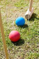 juego de croquet en césped verde foto