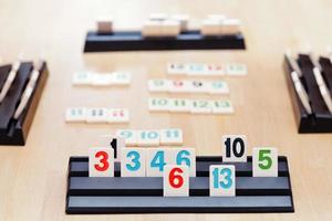 playing in Rummikub board game photo