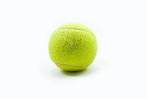 pelota de tenis amarilla hecha de fieltro y caucho foto